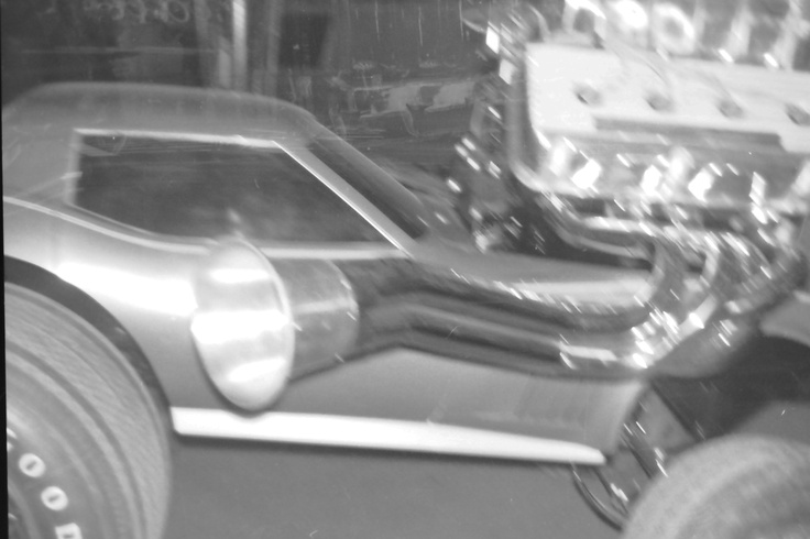 the front end of a car is shown in black and white