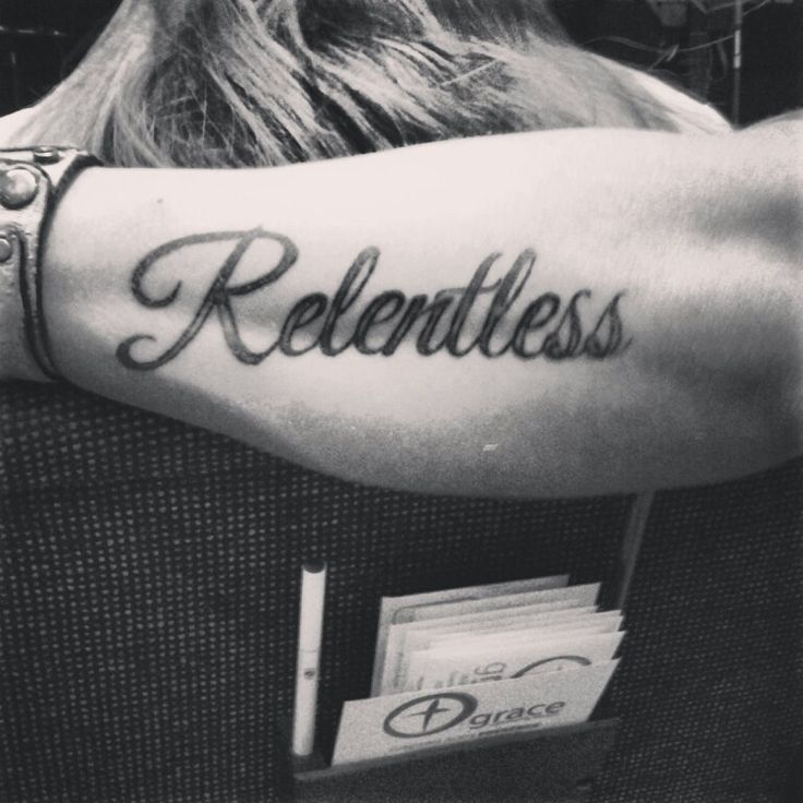 black and white photo of a woman's arm with the word, relentlessess on it