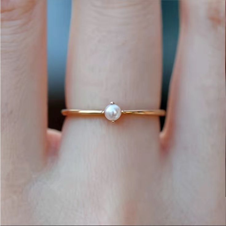 Nwt Elegant Dainty Minimalist Pearl Ring Gold Plated Delicate Layering Ring. Great For Everyday Wear Without Breaking The Bank. Buy With Confidence. All Items Are 100% Authentic, Unless Clearly Noted In Description And/Or Title. Please See “Meet The Posher” For Description Of Abbreviations. Pup Friendly Household- Can’t Live Without Them. I Keep My Items In A Separate Room But Please Forgive Me If A Random Hair Sticks To Me And Makes It To Packaging. Posh Ambassador Top Seller Fast Shipping Make Womens Rings Simple, Pearl Ring Simple, Shiny Rings, Tiny Rings, Gold Ring Sets, Opal Ring, Minimalist Rings, Mua Sắm, Color Ring