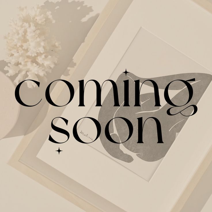 the words coming soon are displayed next to a vase with flowers and an open book