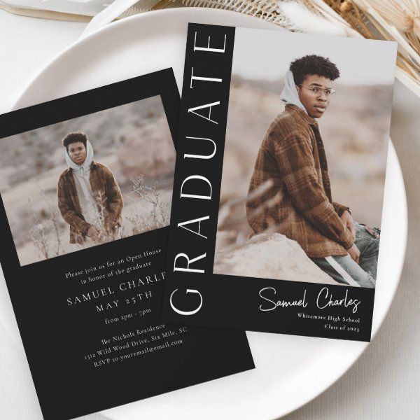 two black and white graduation announcement cards on a plate