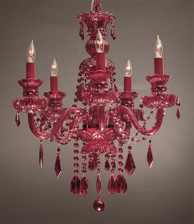 a red chandelier hanging from the ceiling