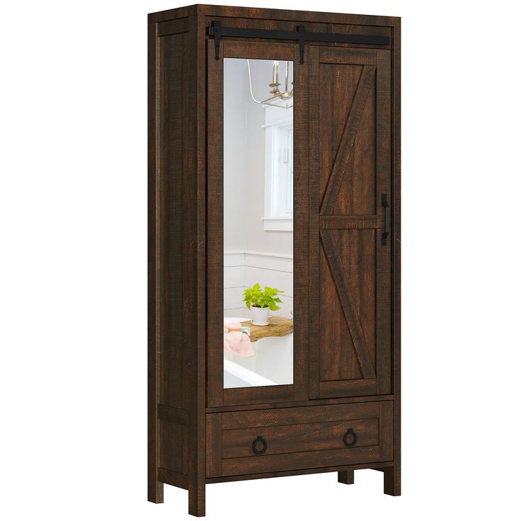 a wooden armoire with a mirror on it