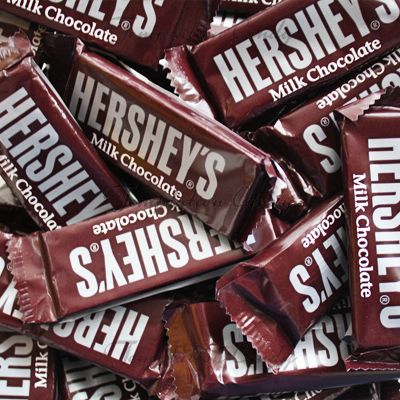 hershey's milk chocolate bars are piled on top of each other in a pile