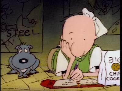 a cartoon character writing on a book next to a dog