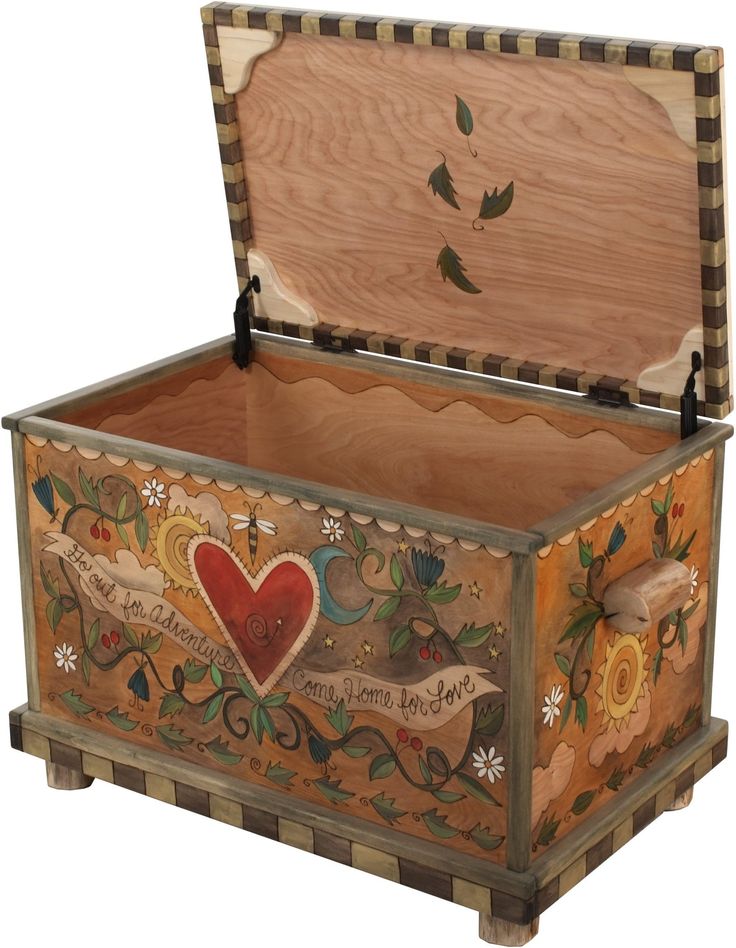 an ornate wooden box with painted designs on the lid and sides, decorated with flowers and hearts