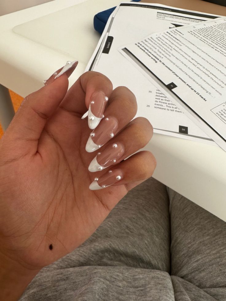 Square French Tip Acrylic Nails With Pearls, White Nail Inspo With Gems, Acrylic Nail Designs Perl, Birthday Nails With Pearls, French Tips Nails With Pearls, White Tip Nails With Gems, White Nails W Pearls, Coffin French Tip Nails With Pearls, White Pearls Nails