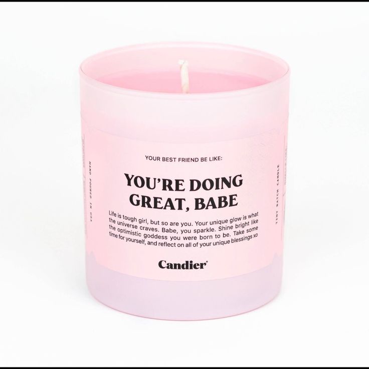 a pink candle that says you're doing great, babe