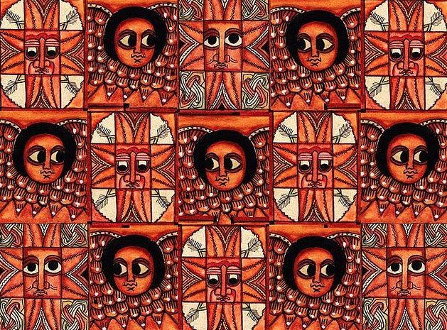 an image of a woman's face in red and orange colors with intricate designs on it