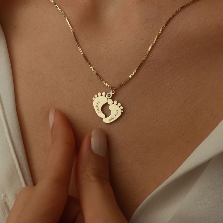 Celebrate motherhood with our Personalized First Time Mom Necklace. This beautiful piece of jewelry features a delicate baby footprint pendant, customizable with your baby's name. Perfect for first-time moms, as a push present, or as a special Christmas gift. Cherish the memories of your little one with this meaningful necklace. + How to Order1 : Choose necklace size: 2: Choose Material: 925 Sterling Silver, 14K Gold Filled, 14K Rose Gold Filled.3: Please send us name and date of birth so that we can engrave as shown in the listing.Birthstone is optional, please add the birthstone if you wish, otherwise we will make with no birthstone! Keepsake Yellow Gold Name Jewelry, Push Gifts For New Mom, Personalized Jewelry For Mom, Personalised Jewellery Necklaces, Push Present, Push Presents, Baby Footprint, Meaningful Necklace, Shiny Jewelry