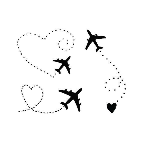 an airplane is flying in the sky with hearts