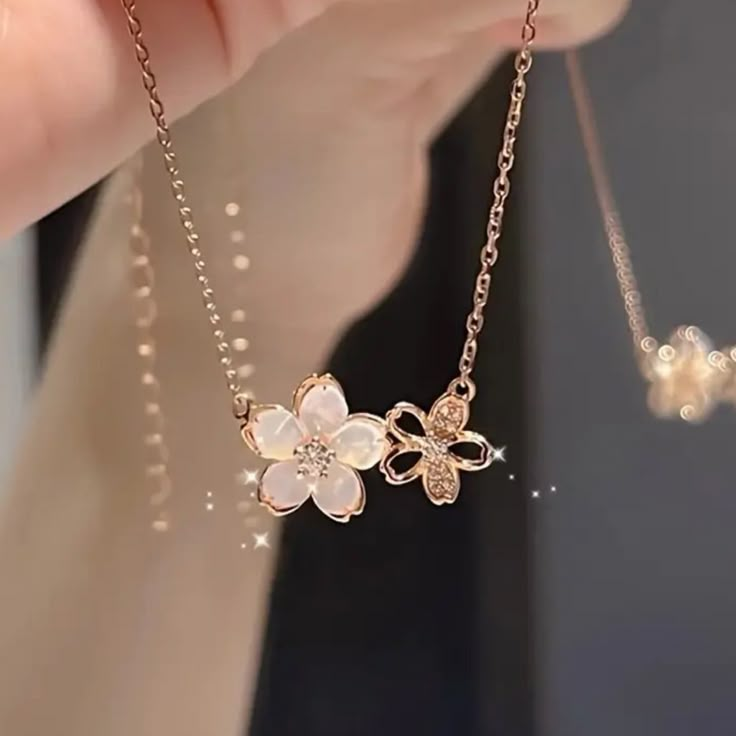 This Delicate Blossom Flower Pendant Gold 18k Filled Necklace Is A Beautiful Symbol Of Grace And Femininity. Featuring Two Intricately Designed Flowers, This Dainty Necklace Adds A Touch Of Elegance To Any Outfit. The Fine Silver-Tone Chain Is Lightweight And Comfortable, Making It Perfect For Everyday Wear Or As A Special Accent Piece For Formal Occasions. The Delicate Floral Design Brings A Fresh, Natural Charm, Making This Necklace A Wonderful Gift Or A Timeless Addition To Your Jewelry Colle Girly Necklace Aesthetic, Pearl Flower Jewelry, Floral Gold Jewellery, Minimalist Jewlery, Modest Jewelry, Everyday Gold Jewelry, Girly Necklace, Simple Gold Jewelry