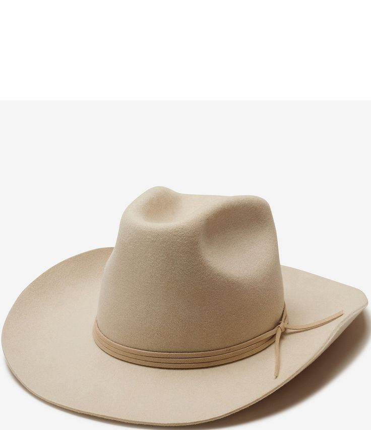 From Wyeth&#x2C; the Blaze Wool Cowboy Hat features:WoolSuede trimPinched crownOne sizeVelcro size adjuster tucked inside the inner sweatband for a customizable fitApprox. 5.75" crown&#x2C; 3.75" brimImported. Era Fashion, Mom Era, Quality Hats, Cowboy Hat, Dillard's, Wide Brimmed, Sun Hats, Suede Leather, Fedora