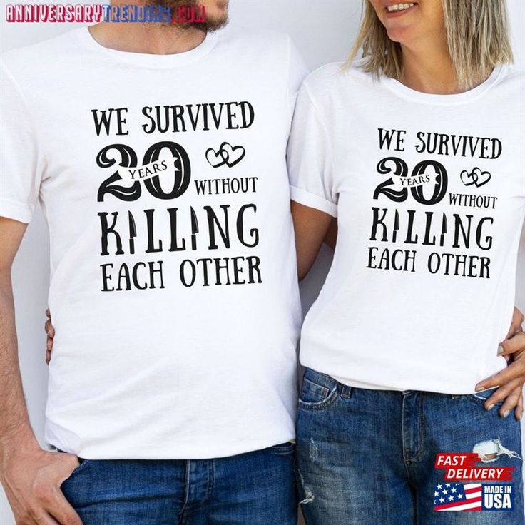 two people wearing t - shirts that say we survived 20 years without killing each other