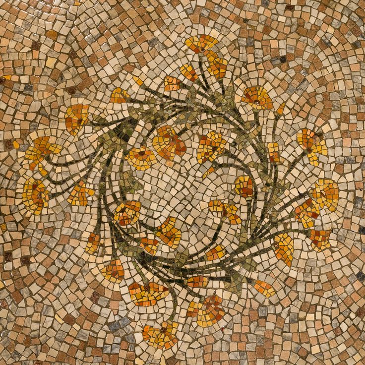 an artistic mosaic design with yellow flowers