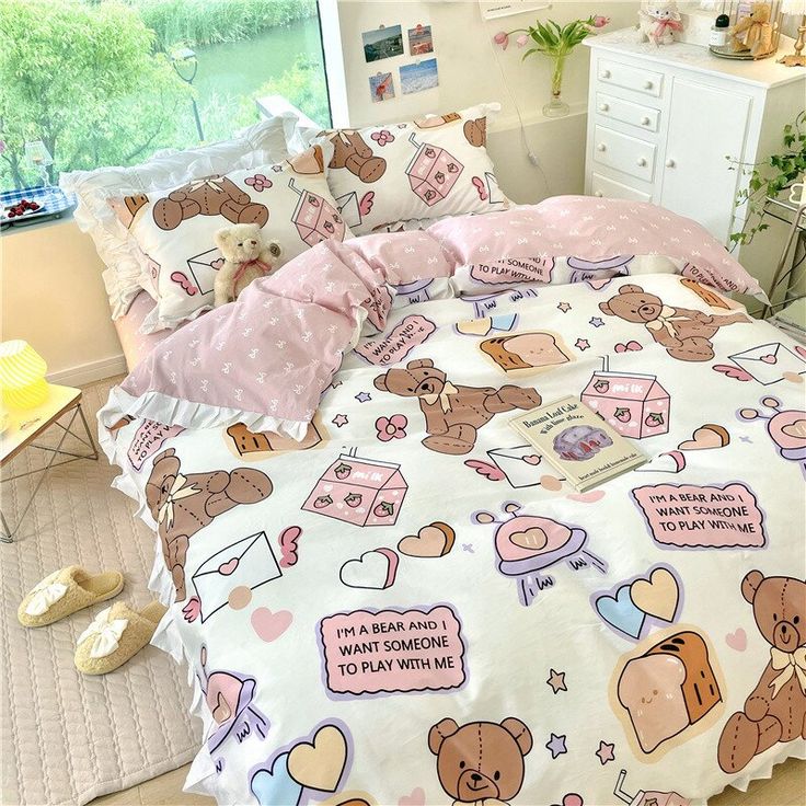 a bed with teddy bears and hearts on it