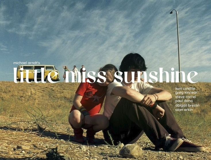 two people sitting on the ground in front of a sign that says little miss sunshine