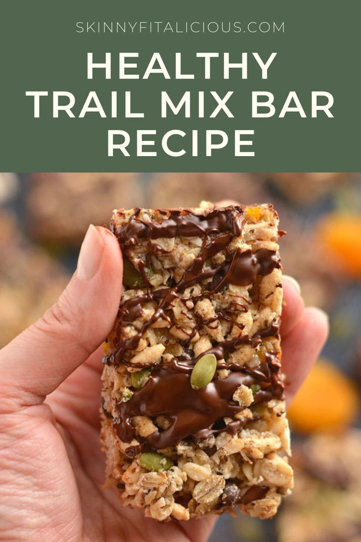 healthy trail mix bar recipe in the palm of someone's hand with text overlay