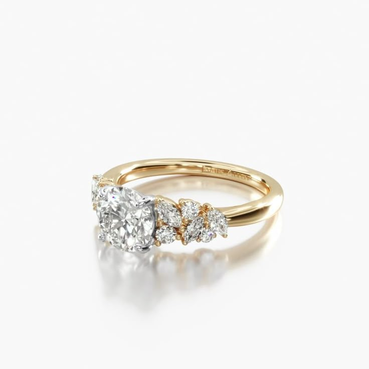 a three stone diamond ring in yellow gold