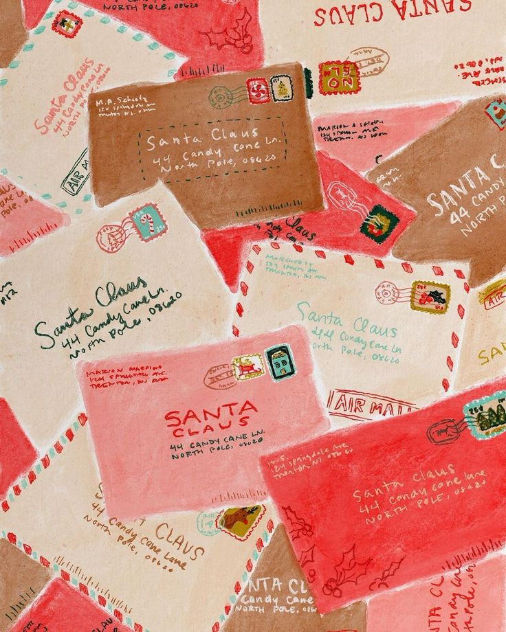 many different types of envelopes are on the table top with red and brown paper