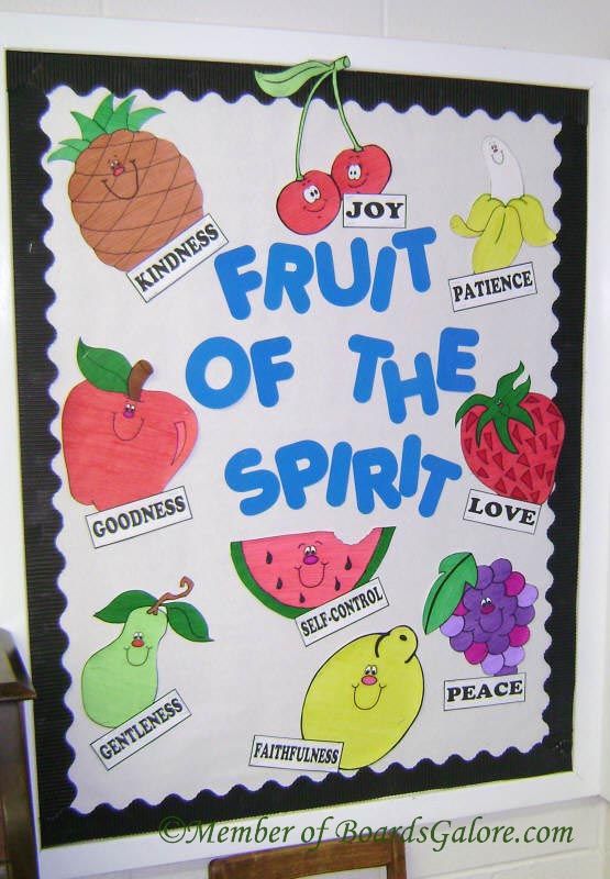 a fruit of the spirit bulletin board with pictures of fruits on it and words written below