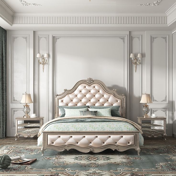 an elegant bedroom with white walls and gold accents, including a bed in the middle