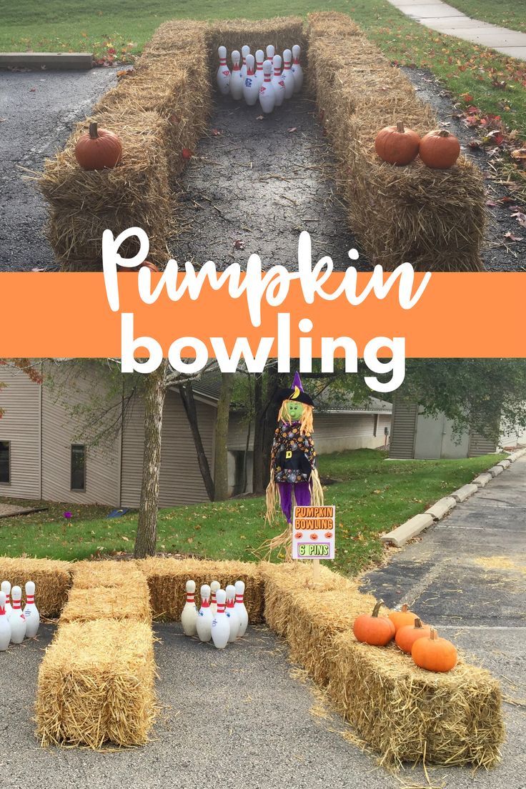 pumpkin bowling game in the yard with hay bales