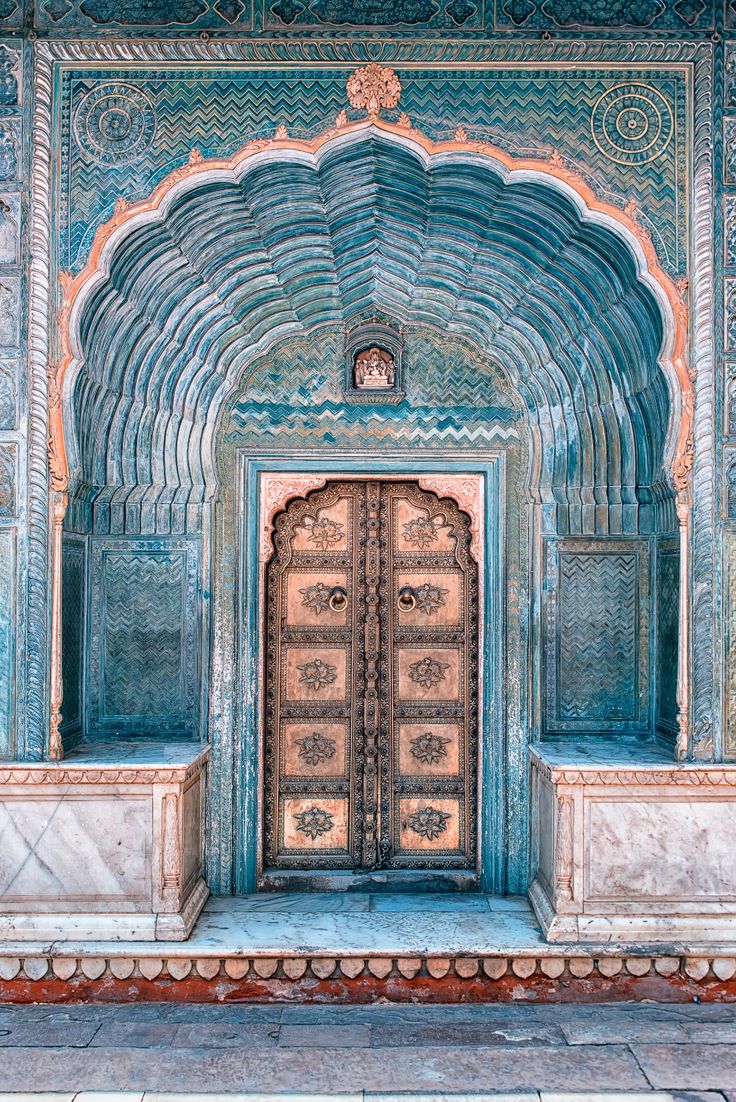 an ornate doorway in the middle of a building