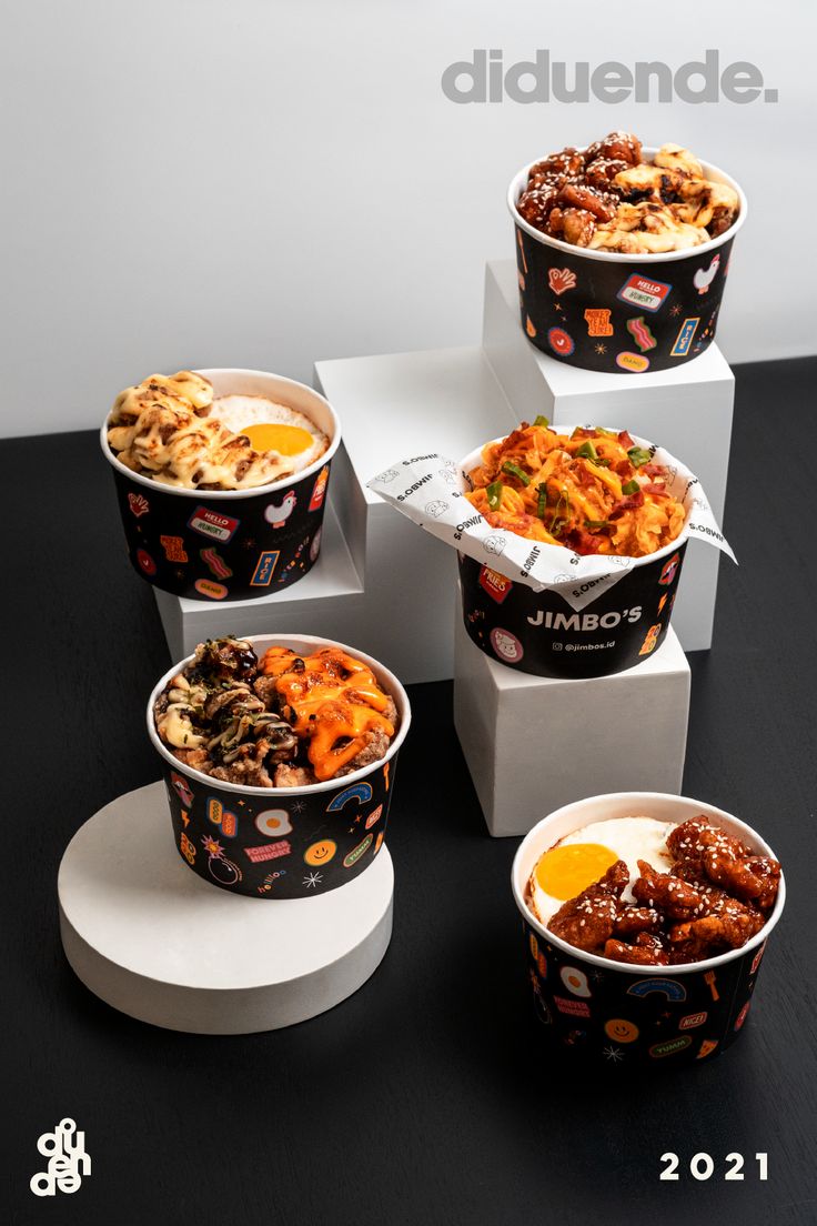 five different types of food in containers on display