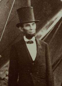 an old black and white photo of a man wearing a top hat