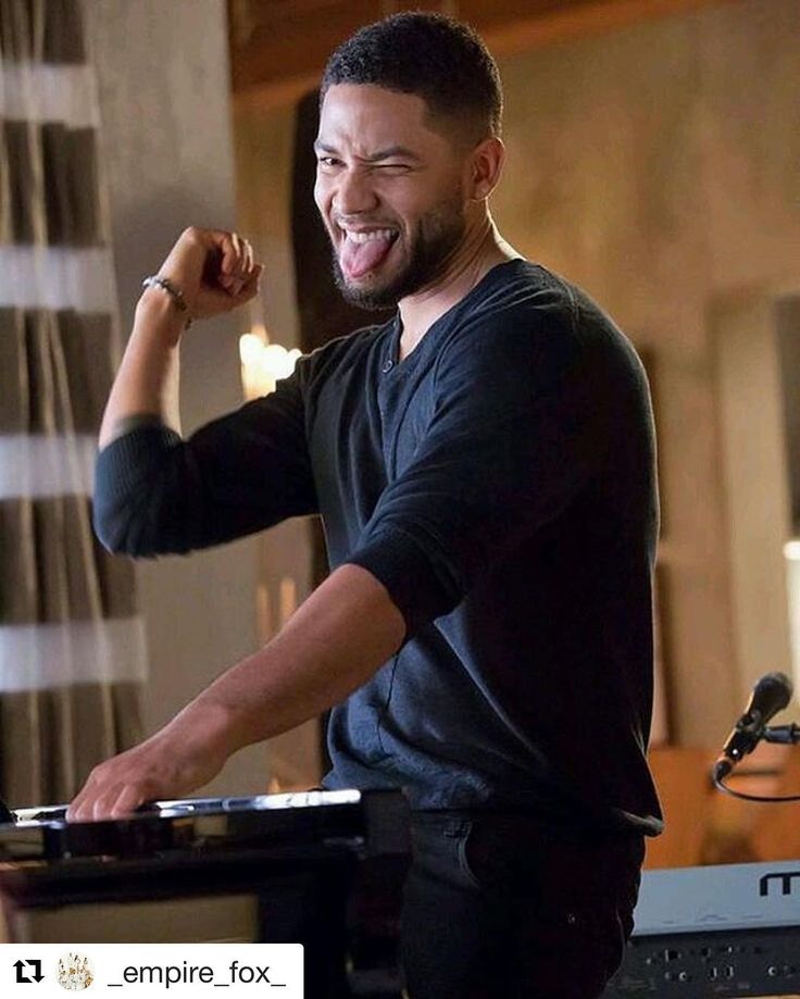 a man that is standing in front of a keyboard