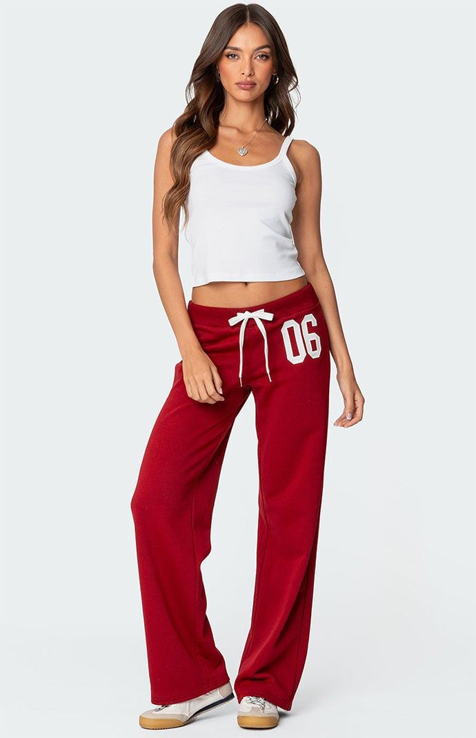 Reach your ultimate level of coziness while still feeling on-trend with these perfect 06 sweatpants from Edikted.SweatpantsStraight leg fitAdjustable tie waistEmbroidered patchCotton, PolyesterModel wears size SModel height is 5'8Item care: Machine wash at maximum 30C, do not bleach, do not tumble dry, iron at a maximum of 110C, do not dry clean. Edikted Womens 06 Sweatpants - Red size Medium Sweatpants Straight Leg, Polo Sweatpants, Red And White Outfits, Red Sweatpants, Cute Everyday Outfits, Womens Loungewear, White Outfits, S Models, Embroidered Patches