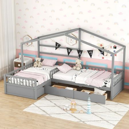 a child's bedroom with a bed, dresser and teddy bear on the floor