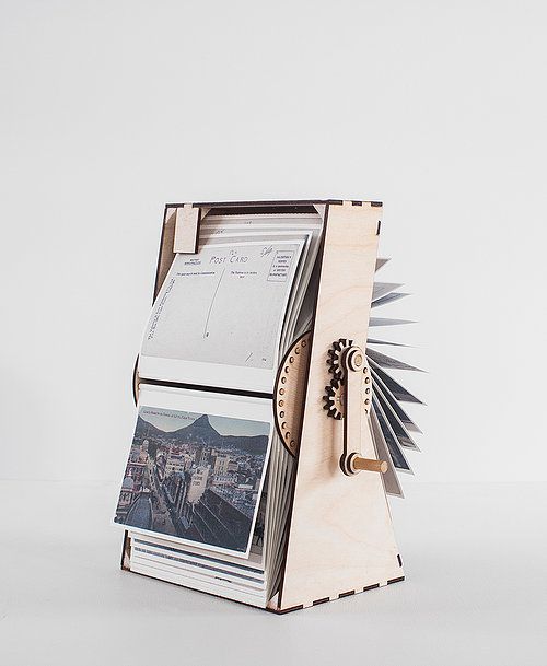 an open magazine holder with pictures on it