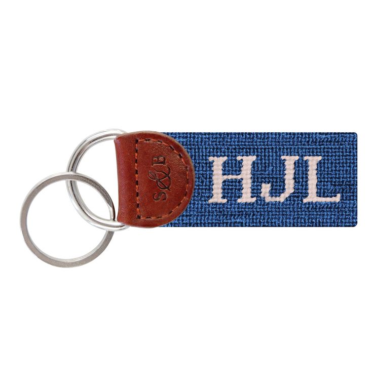 a blue and white keychain with the word hull on it's side