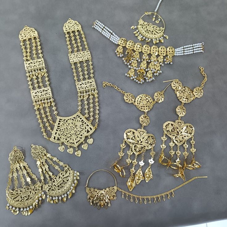 This Is Beautiful Punjabi Jadau Necklace With Gold Plated Earings For Women And Girls | Gold Plated And Pearl Jewellery | Sangeet Jewellery | Punjabi Jewellery | Nikah Jewellery | Indian Wedding / Gold Plated Set / One Gram Gold Set / Gold Necklace Set Made With Gold Plated , Pearls , Beads , Pipal Patti . Thank You :) Punjabi Wedding Jewelry Sets, Yellow Gold Chandbali Bridal Necklace, Heavy Gold Jewelry For Celebration, Yellow Gold Chandbali Bridal Necklace For Wedding, Kundan Jewelry Sets In Yellow Gold For Wedding, Kundan Yellow Gold Jewelry Sets For Wedding, Gold Chandbali Temple Necklace For Wedding, Wedding Chandbali Necklace With Intricate Design, Heavy Jewelry For Diwali Celebration