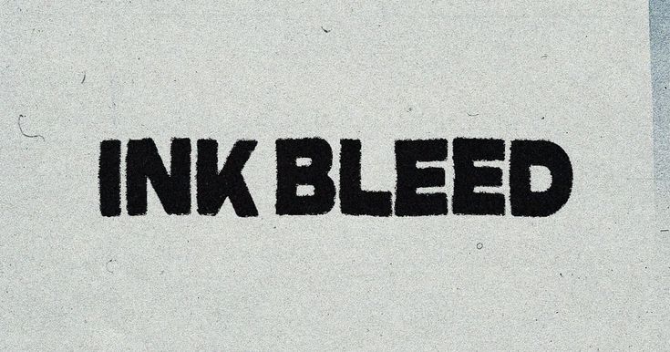 the word ink bled is written in black on a white background