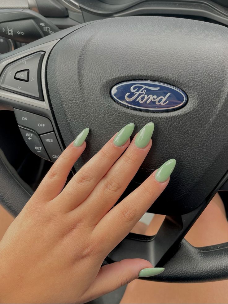 Spring Nails 2023 Gel Almond Green, Simple Acrylic Nails Almond Green, Sage Green Gel Nails Almond, Summer Acrylic Nails Sage Green, Almond Acrylic Nails Sage Green, Safe Green Acrylic Nails, Sage Green Nails Acrylic Almond Design, Mint Green Oval Nails, Sage Green Almond Shaped Nails