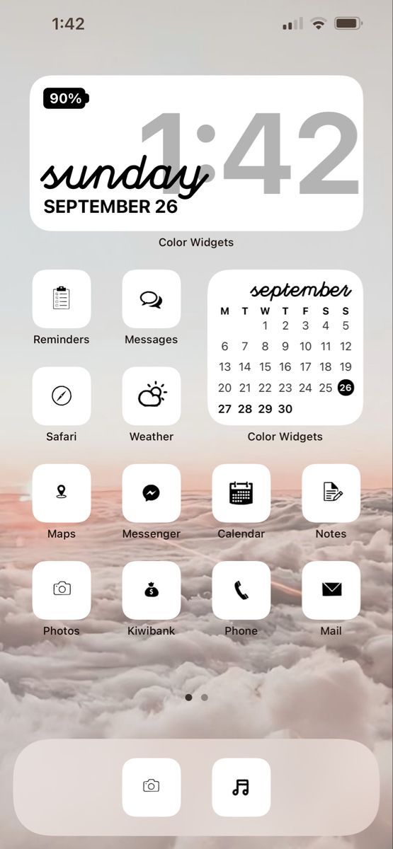 an iphone screen showing the weather and calendars for the month ahead, with clouds in the background