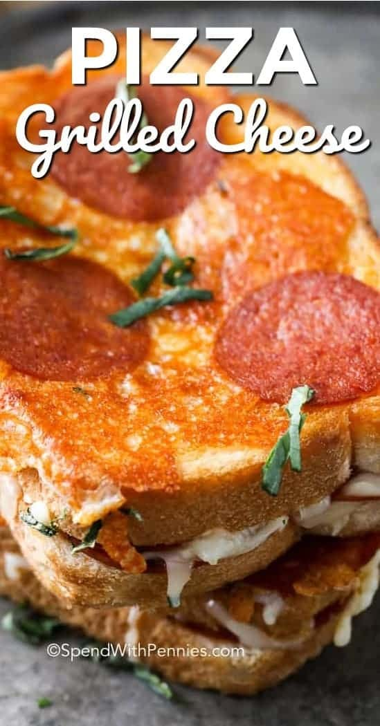 a close up of a pizza on a plate with the words grilled cheese over it