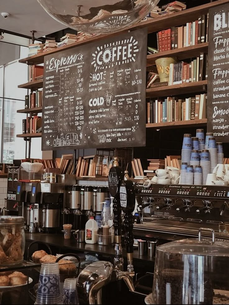 the coffee shop has many different types of items on display for customers to see and eat