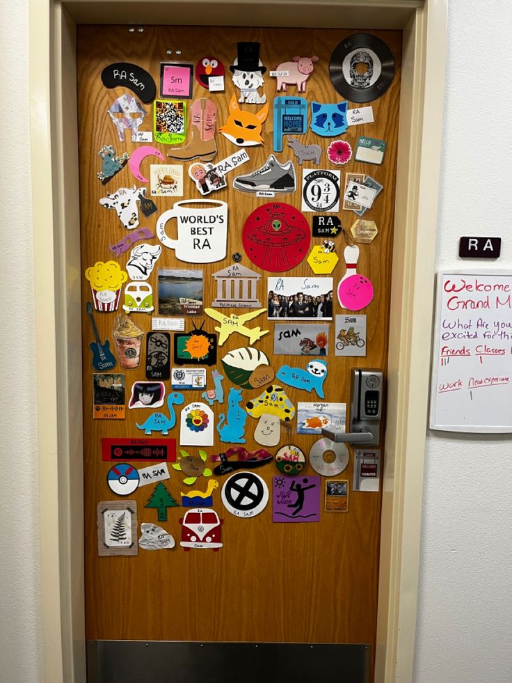 the door is decorated with many different items and stickers on it, as well as a sign