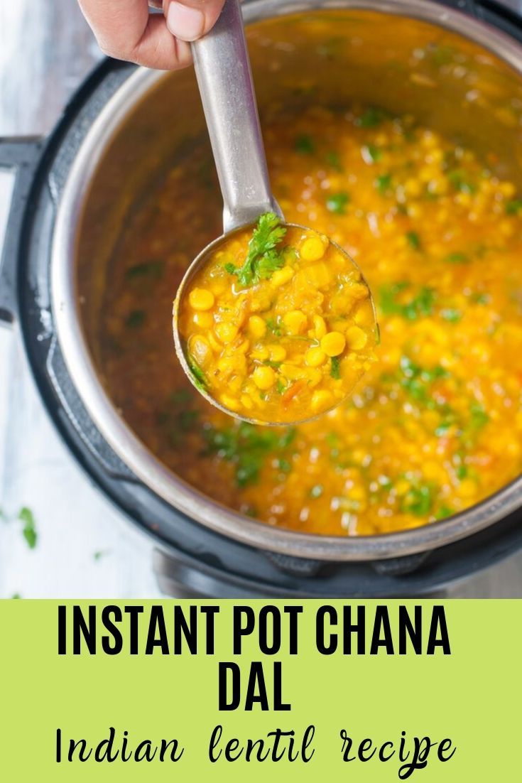 instant pot chana dali recipe in an instant pot with a ladle full of it