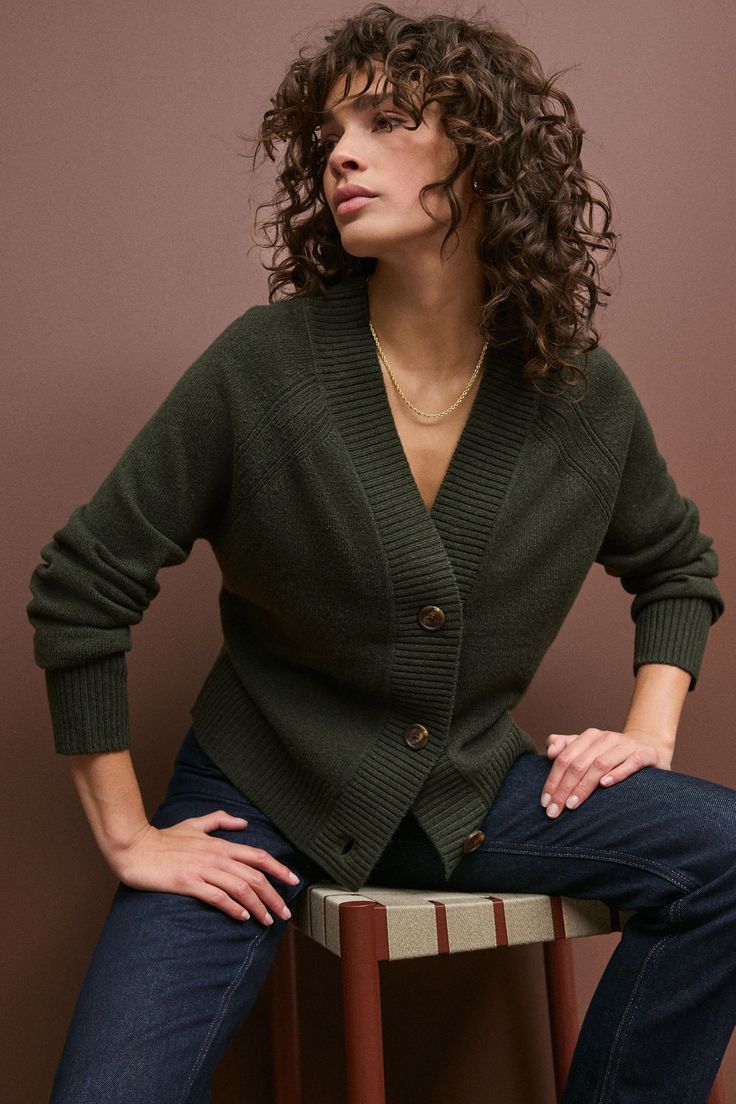 This timeless knitted cardigan is made from pure lambswool, with naturally hypoallergenic and moisture wicking properties. The cardigan has a button-up fastening and a ribbed v-neck collar, finished with wide ribbed hems. Machine washable. 100% Lambswool. Olive Cardigan Outfit, Olive Green Cardigan Outfit, Green Cardigan Outfit, Olive Cardigan, Wedding Cardigan, Olive Green Cardigan, Short Wedges, Jumper Short, Nike Dresses