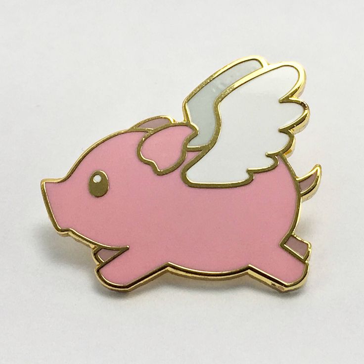 a pink and white pin with an angel on it's back, sitting in front of a white background