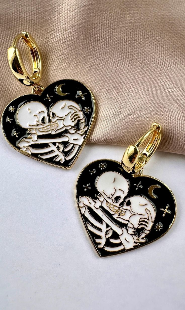 Are you looking for the perfect skeleton earrings for someone special this gifting season? Or a unique pair of Skeleton kissing Halloween hoop earrings to spoil your bestie or significant other? Made with tarnish-free stainless steel and bright enamel, my skeleton lovers earrings set is the perfect compliment to any outfit idea! My Halloween jewelry for women is a great gift idea for any special occasion to all the women in your life. You can't go wrong when gifting my skeleton kissing jewelry t Emo Metal Earrings For Halloween, Metal Skull Print Jewelry For Halloween, Edgy Halloween Jewelry, Halloween Skull Print Earrings, Edgy Jewelry For Halloween Gift, Black Themed Jewelry For Valentine's Day, Themed Black Jewelry For Valentine's Day, Halloween Emo Pierced Earrings, Emo Pierced Jewelry For Halloween