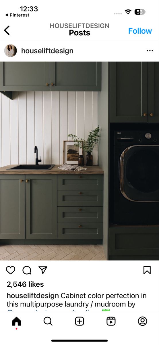 an image of a kitchen with green cabinets and grey appliances on the bottom right hand corner