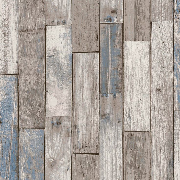 an image of wood flooring that is painted blue and grey with white paint on it