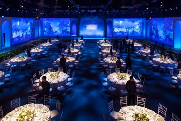 a large banquet hall with tables and chairs