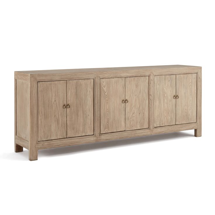 the sideboard is made from wood and has four doors on one side, with two drawers